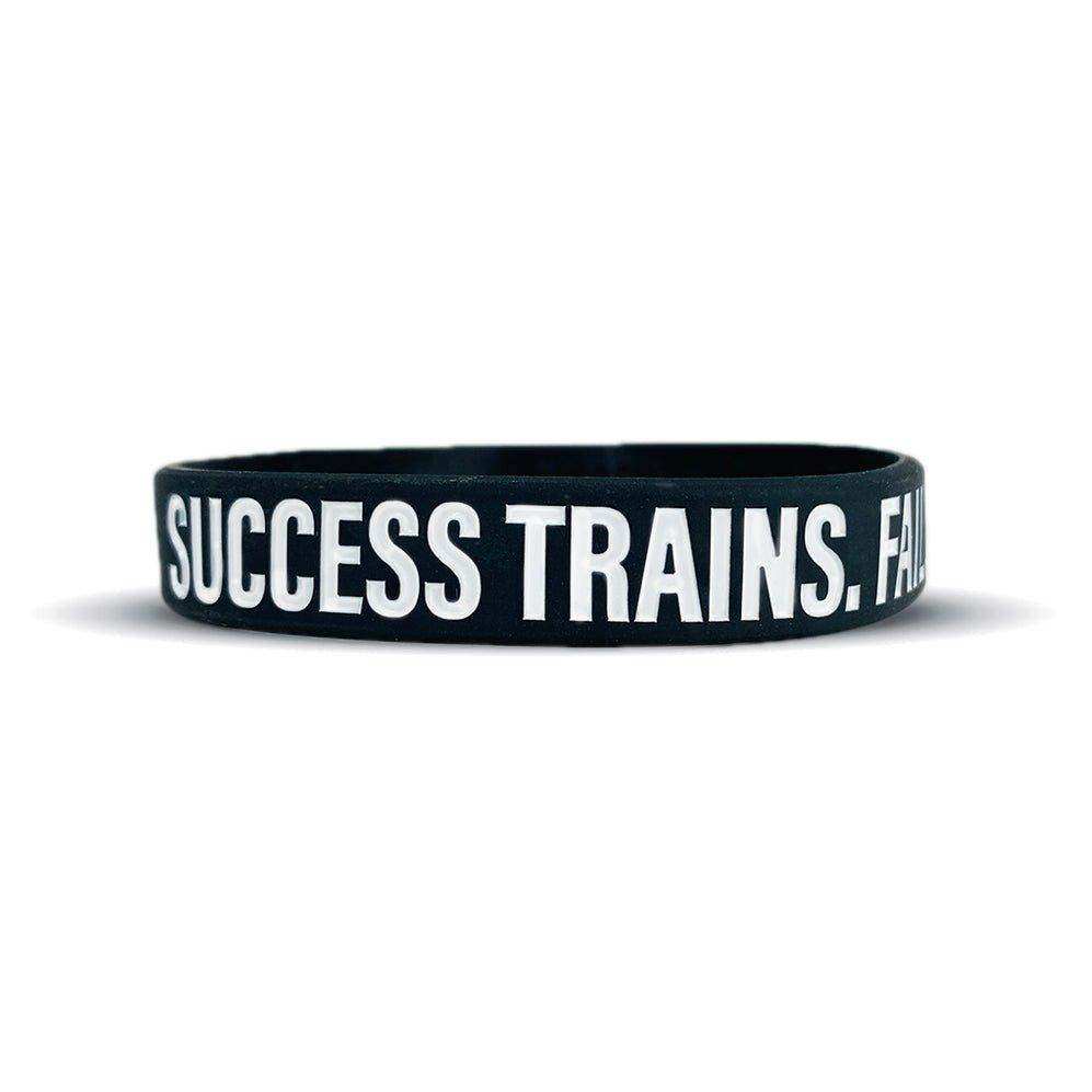 SUCCESS TRAINS. FAILURE COMPLAINS. Wristband - Skoutley Outdoors LLC