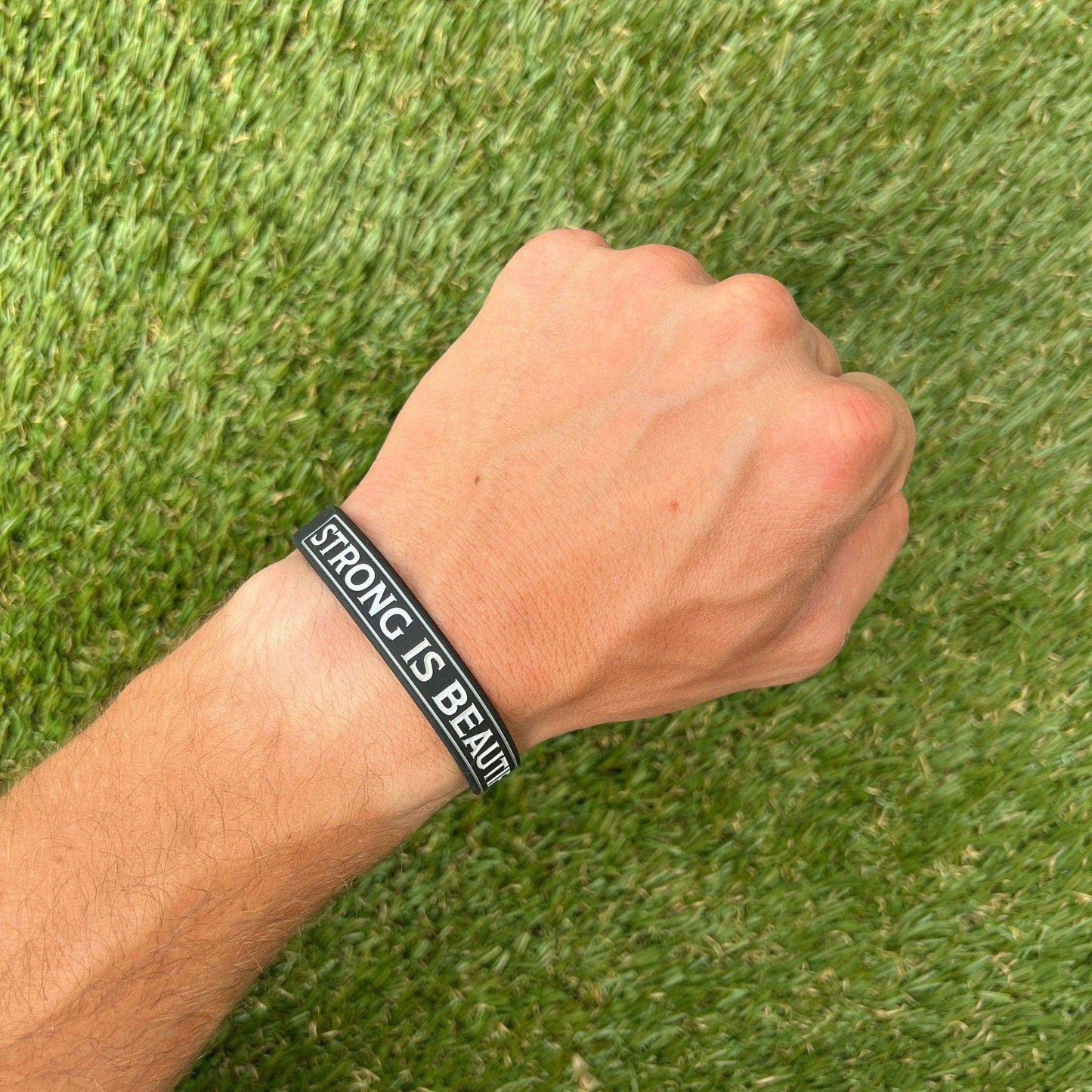 STRONG IS BEAUTIFUL Wristband - Skoutley Outdoors LLC